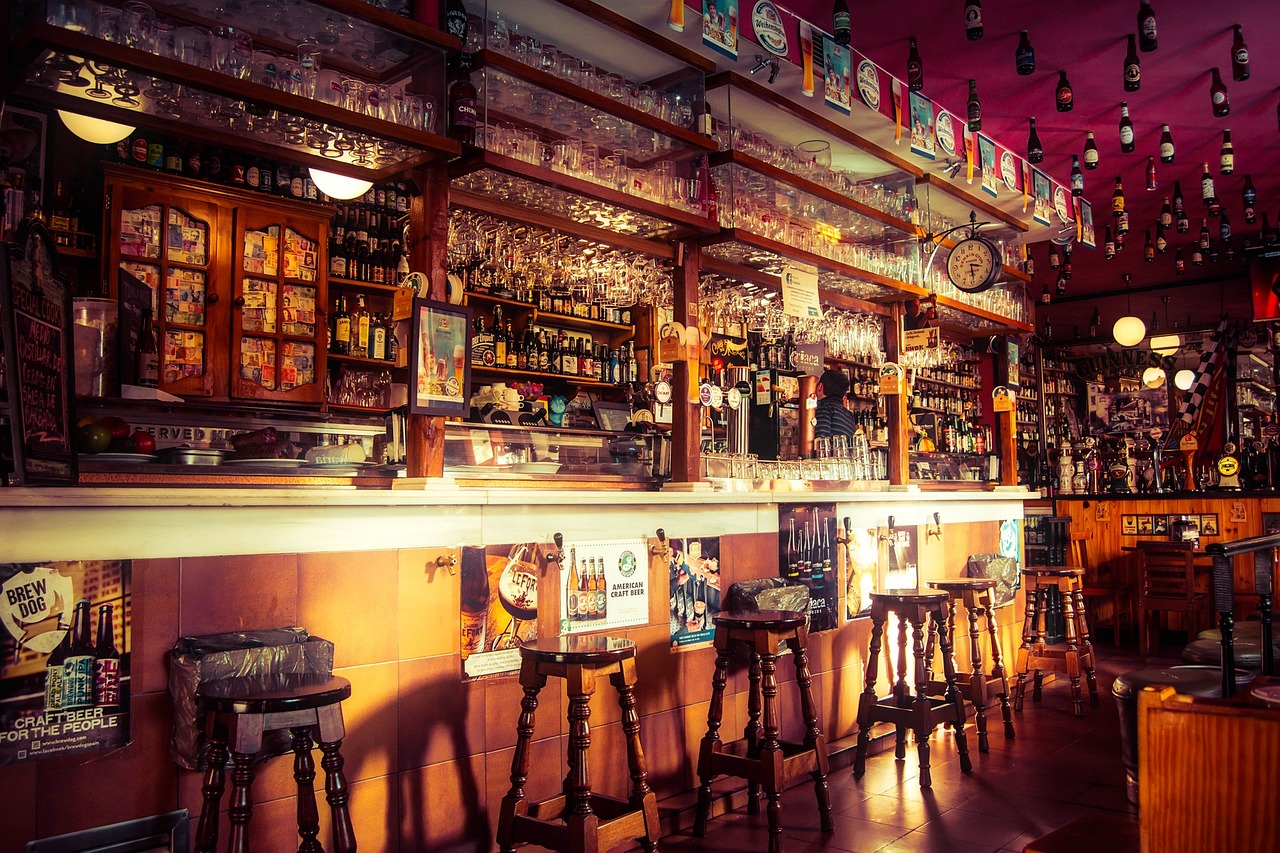 The counter and stools in warm light